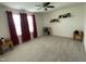 Well-lit bedroom featuring a ceiling fan, and shelves at 30 Junius Birch Trl, Franklinton, NC 27525