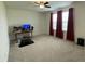 Bright bedroom featuring three windows with curtains at 30 Junius Birch Trl, Franklinton, NC 27525
