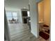 Bright dining area and kitchen with modern appliances and light gray flooring at 30 Junius Birch Trl, Franklinton, NC 27525