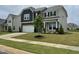 Charming two-story home features a well-manicured lawn and inviting curb appeal at 30 Junius Birch Trl, Franklinton, NC 27525