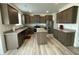 Well-equipped kitchen with granite countertops, stainless steel appliances, and a kitchen island at 30 Junius Birch Trl, Franklinton, NC 27525
