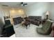 Spacious living area featuring comfortable sofas and carpeted flooring at 30 Junius Birch Trl, Franklinton, NC 27525