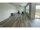 Bright living space with large windows and exercise equipment at 30 Junius Birch Trl, Franklinton, NC 27525