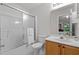 Bright bathroom featuring tub with shower, vanity and toilet at 3021 White Cloud Cir, Apex, NC 27502