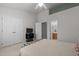 Bedroom featuring a queen sized bed, an en suite bath, and double-door closet for ample storage at 3021 White Cloud Cir, Apex, NC 27502
