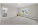 Bright bedroom with carpet, and an ensuite bathroom at 329 Broad Elm Ln, Apex, NC 27523