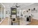 Bright living room features built-in shelving, a cozy fireplace, and beautiful décor at 329 Broad Elm Ln, Apex, NC 27523