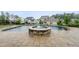 Lovely in-ground pool with connected jacuzzi and professionally installed pavers at 329 Broad Elm Ln, Apex, NC 27523