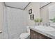 Bathroom featuring a shower/tub combo, a white sink vanity, and updated fixtures at 332 Eastfield Dr, Rocky Mount, NC 27801