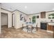 Eat-in kitchen featuring a round dining table, four chairs, and attractive decor, adding warmth to the space at 332 Eastfield Dr, Rocky Mount, NC 27801