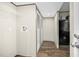 Laundry room with washer/dryer connections, storage shelving, and close proximity to living area at 332 Eastfield Dr, Rocky Mount, NC 27801