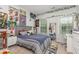 Unique bedroom with stylish decor, including posters, vines, and colorful accents at 352 Fire Opal Ln, Holly Springs, NC 27540
