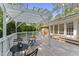 Spacious back deck with pergola, offering a serene outdoor seating area with access to the backyard at 3911 Hope Valley Rd, Durham, NC 27707