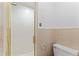Bathroom featuring a frosted glass shower and vintage tile accents at 3911 Hope Valley Rd, Durham, NC 27707