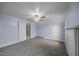 Comfortable bedroom features fresh paint, neutral carpet, and an elegant ceiling fan at 421 E Morehead St, Burlington, NC 27215