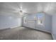 Large bedroom featuring fresh paint and neutral carpeting with lots of natural light at 421 E Morehead St, Burlington, NC 27215