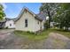 This charming home boasts a traditional architectural design with a classic gabled roof at 421 E Morehead St, Burlington, NC 27215