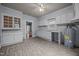 Open kitchen with laminate floors, white cabinets, and great natural light at 421 E Morehead St, Burlington, NC 27215