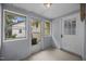Enclosed sunroom featuring lots of natural light and entry to the home's interior at 421 E Morehead St, Burlington, NC 27215