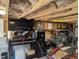 Unfinished basement featuring storage shelves, a workbench and tool storage at 461 Cedar Pond Ct, Knightdale, NC 27545