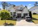 Beautiful home with a three-car garage, manicured lawn, and inviting curb appeal at 461 Cedar Pond Ct, Knightdale, NC 27545