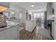 Open concept kitchen featuring an island, stainless steel appliances, and a breakfast nook at 461 Cedar Pond Ct, Knightdale, NC 27545