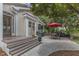 Welcoming backyard features a stone patio, outdoor seating, and manicured garden area for entertaining at 4620 Gomar Ln, Fuquay Varina, NC 27526