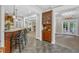 Kitchen featuring breakfast bar and seamless flow to living spaces, perfect for entertaining at 4620 Gomar Ln, Fuquay Varina, NC 27526