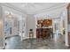 Charming kitchen with breakfast bar, pendant lighting and seamless flow to other rooms at 4620 Gomar Ln, Fuquay Varina, NC 27526