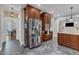 The kitchen features stainless steel appliances, wood cabinets, and adjacent eat-in area at 4620 Gomar Ln, Fuquay Varina, NC 27526