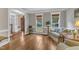 Bright living room with hardwood floors and views of front yard at 4620 Gomar Ln, Fuquay Varina, NC 27526