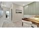Hallway with desk, chair, and view into a bedroom at 5028 Jowetts Walk Dr # 24, Cary, NC 27519
