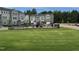 Community playground, surrounded by new construction homes, offers a fun recreational space at 5028 Jowetts Walk Dr # 24, Cary, NC 27519