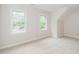 Inviting room showcasing two bright windows and neutral walls at 5800 Heatherbrook Cir, Raleigh, NC 27612
