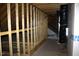 Unfinished attic area, showing the exposed framing and utilities at 5900 Tranquil Cv, Youngsville, NC 27596