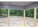 Covered patio overlooking the backyard at 5900 Tranquil Cv, Youngsville, NC 27596