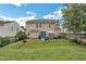 Spacious backyard with well-maintained grass, patio, and a privacy fence that's perfect for outdoor gatherings at 6 Newgate Ct, Durham, NC 27713