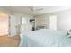This bedroom includes a dresser, TV, white trim, neutral walls, and a baby crib at 6 Newgate Ct, Durham, NC 27713