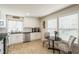 Well-lit kitchen with modern appliances, white cabinets, and a functional layout for easy cooking at 6 Newgate Ct, Durham, NC 27713