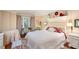 Charming bedroom featuring a comfortable bed, decor and a bright window at 6035 Sentinel Dr, Raleigh, NC 27609