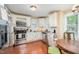 Updated kitchen with stainless steel appliances, granite countertops and plenty of storage space at 6035 Sentinel Dr, Raleigh, NC 27609