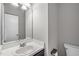 Clean bathroom with vanity, sink and mirror at 612 Quartz Dr, Durham, NC 27703
