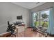 Bedroom with a large window and exercise equipment at 612 Quartz Dr, Durham, NC 27703