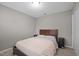 Cozy bedroom with a comfortable queen-sized bed and neutral decor at 612 Quartz Dr, Durham, NC 27703
