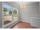Bright dining area with a large window offering pleasant outdoor views at 612 Quartz Dr, Durham, NC 27703