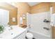 Cozy bathroom with single sink vanity, framed mirror, and bathtub shower combo at 6737 Vernie Dr, Raleigh, NC 27603