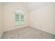 Neutral bedroom with carpet flooring, a ceiling fan, and bright natural light at 6737 Vernie Dr, Raleigh, NC 27603