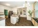 Bright eat-in kitchen featuring an island with bar seating and stainless steel appliances at 6737 Vernie Dr, Raleigh, NC 27603