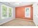 Bedroom featuring natural light from the windows and carpet floors at 6912 Baywood Dr, Raleigh, NC 27613