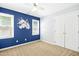 Bedroom featuring carpet floors and natural light from two windows at 6912 Baywood Dr, Raleigh, NC 27613
